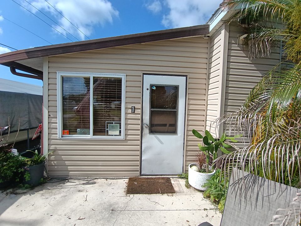 1st image of 8951-78 W 1st St