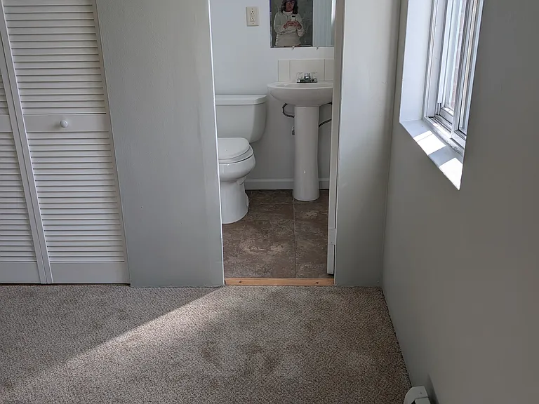 Half bath off larger bedroom
