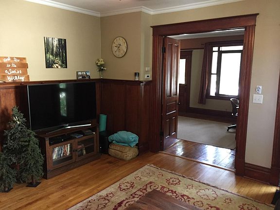 Double door from the living room to the den/entrance