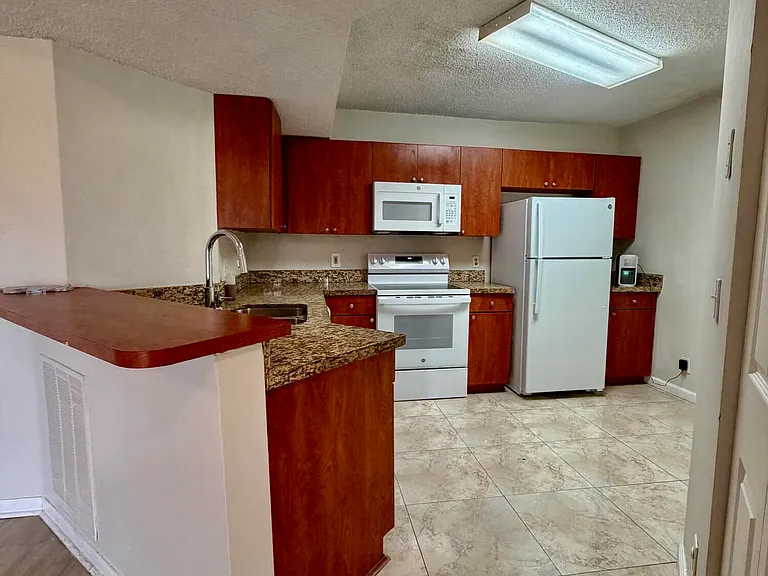 8781 Wiles Rd #203 — Photo 6