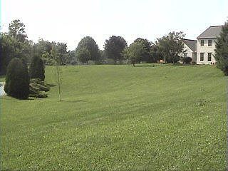 View from lane, sits far back off road