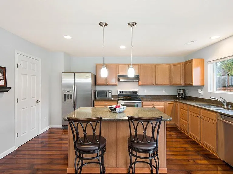View of kitchen from living area