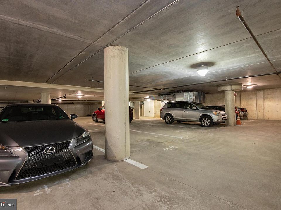 attached assigned parking space included
