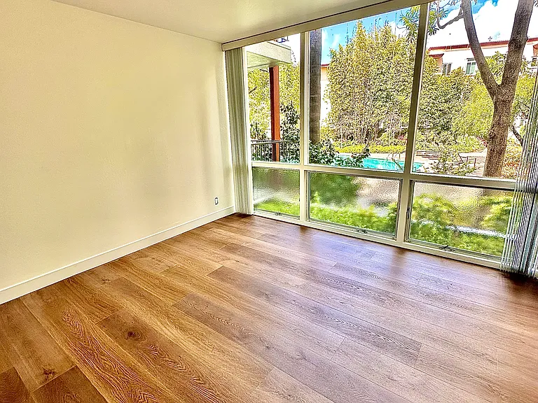 Unit #115 spacious similar 2nd bedroom with gorgeous floor-to-ceiling windows!