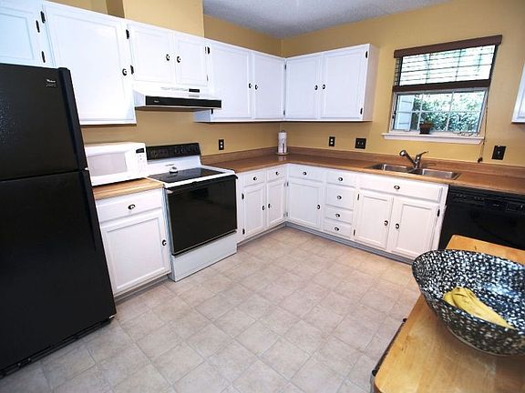Check out the large kitchen! Room for a table + loads of counter space