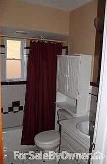 1st floor shared bath
						:
						1st floor tiled bathroom has both a shower and bathtub; shared between 1st fl br