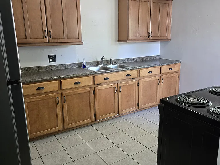 kitchen new appliances stove and refrigerator
