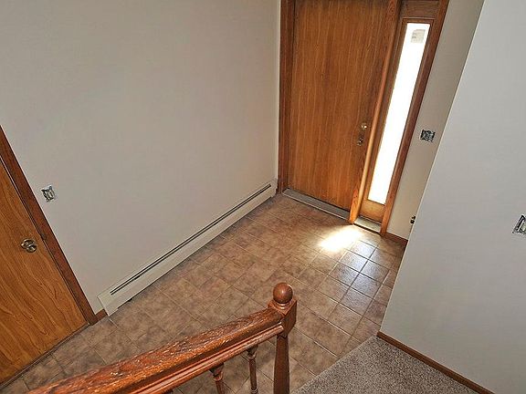 A spacious entry foyer provides your guests a warm welcome