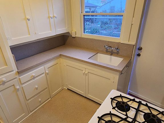 Kitchen with new counter in apartment #1.
