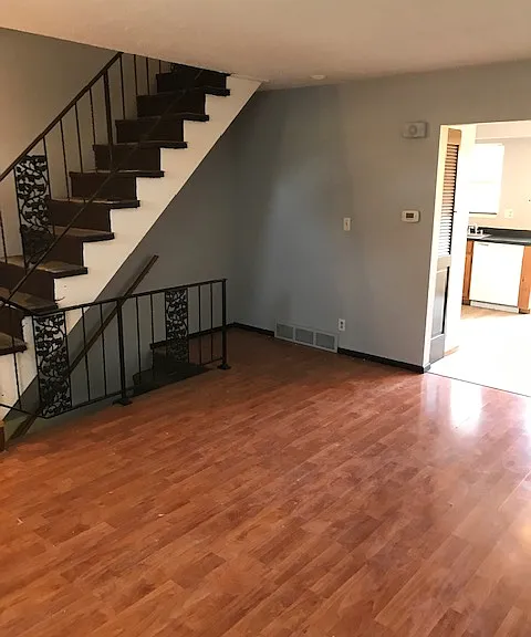 2 Stairways from living room to upper level and basement level