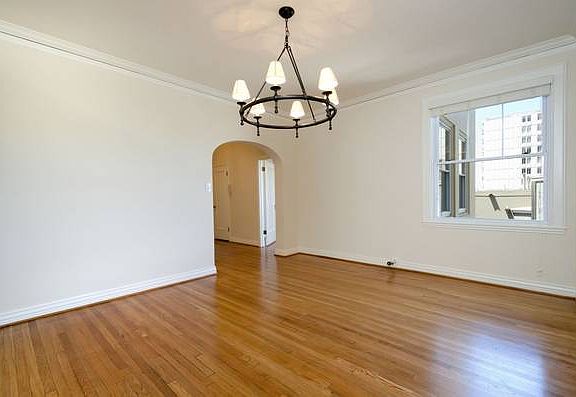 Unit #402 large separate dining room with fabulous natural light!