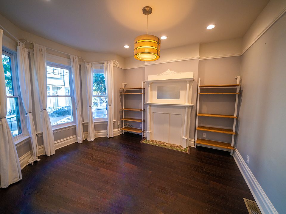 Beautiful Living Room with a view. Facing 24th ST with double pane windows. Whisper quiet!