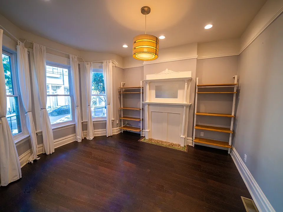 Beautiful Living Room with a view. Facing 24th ST with double pane windows. Whisper quiet!