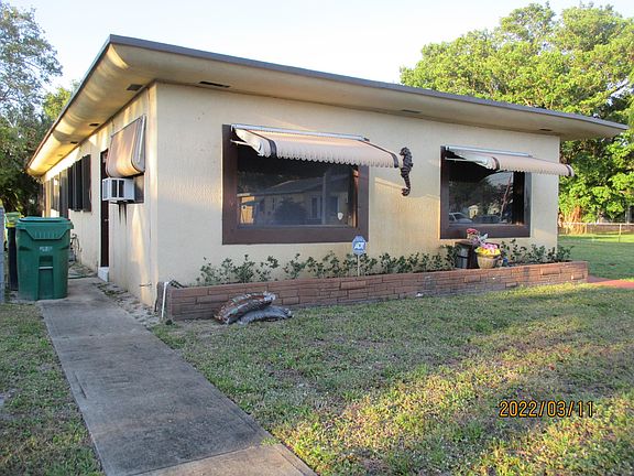 Closeup of front of house plus walkway to west side of house