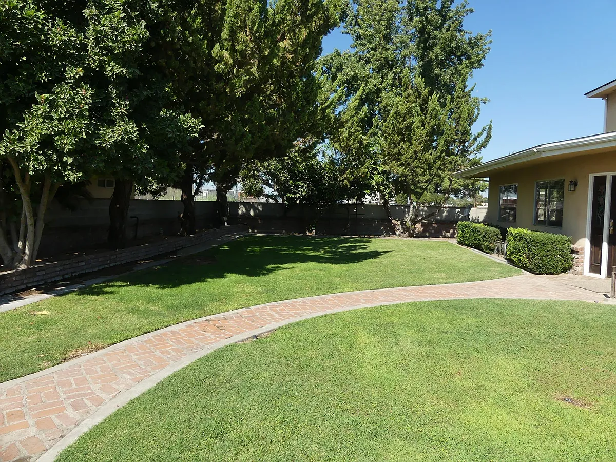 Building Photo - 12115 S Temperance Ave
