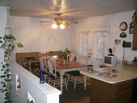Kitchen Entry from the Carport and stairway to the basement
