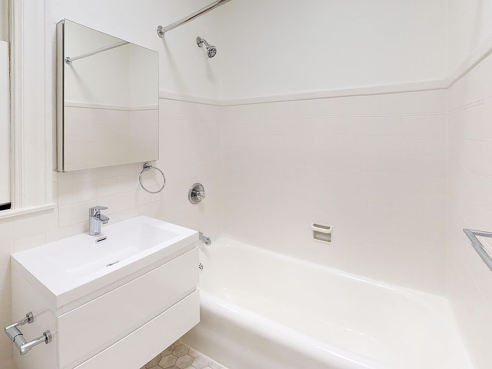 Bathroom with sink and bathtub