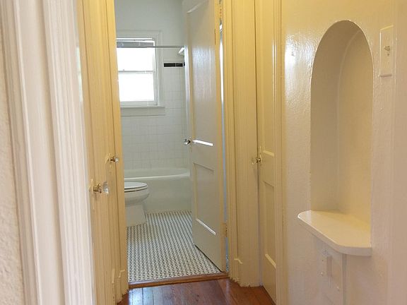 Hallway from the living room to the bathroom and bedroom