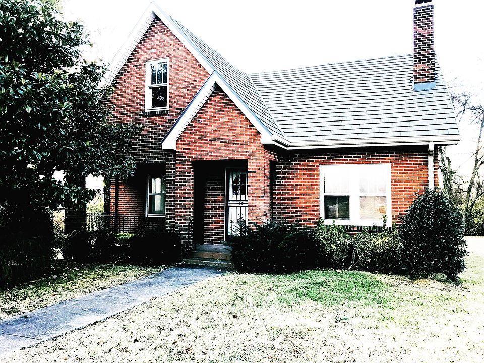 Front porch with plenty of room for a bench or chairs!