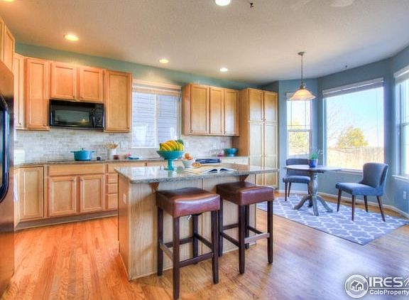 HW floors, Maple cabinetry