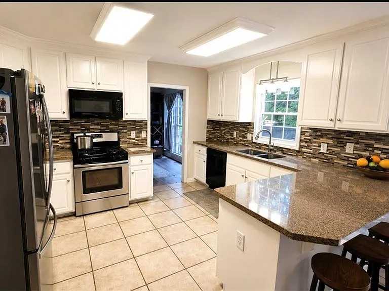 6116 Braidwood Ln NW — Photo 8