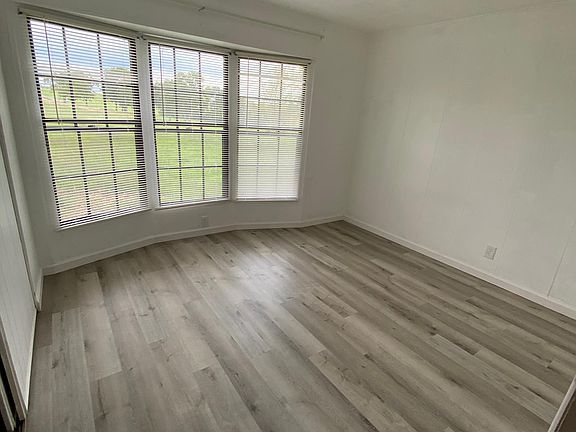 Smaller bedroom #2, windows face farm and fields.