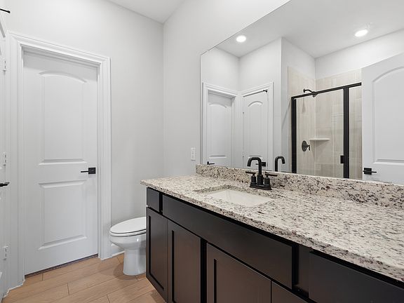 The master bathroom of the Piper has a large vanity.