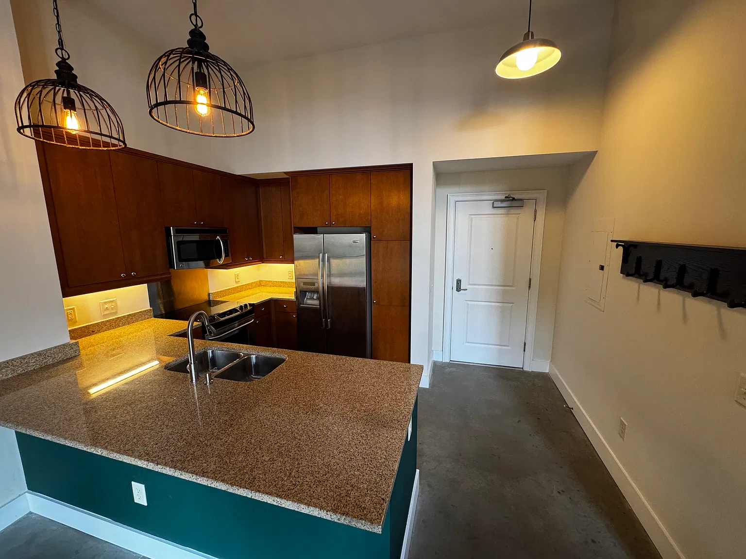 Kitchen: Stainless Steele side by side fridge, electric Stove top/oven combo and dishwasher.
