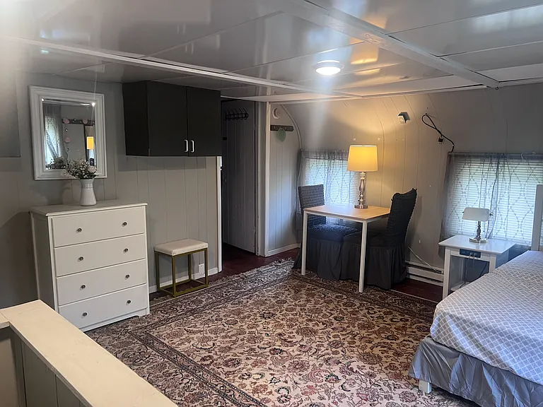 2nd floor furnished bedroom #1 with twin bed, dressers, etc