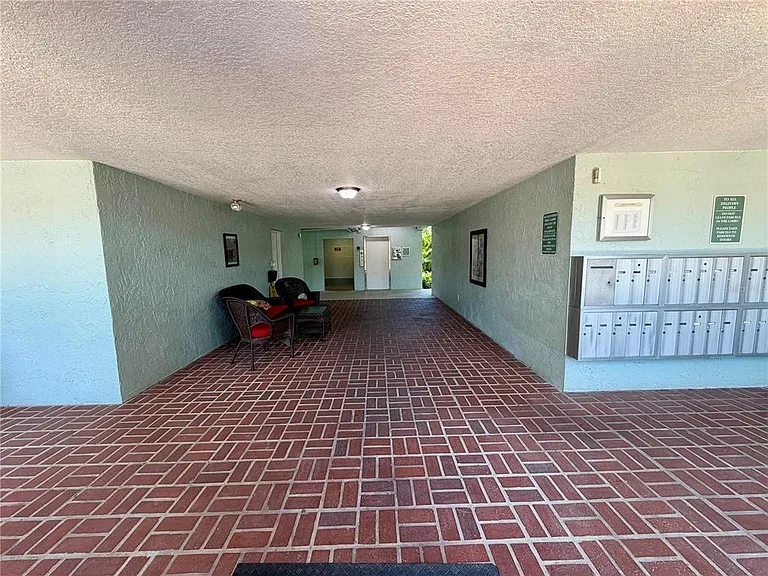 1706 Belleair Forest Dr #244 — Photo 30
