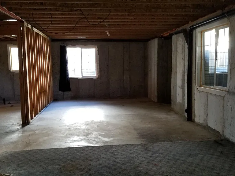 East side of unfinished basement.