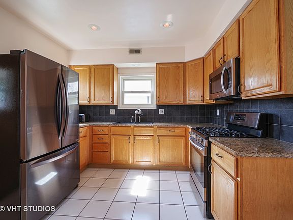 4th image of 4143 N Ozanam Ave