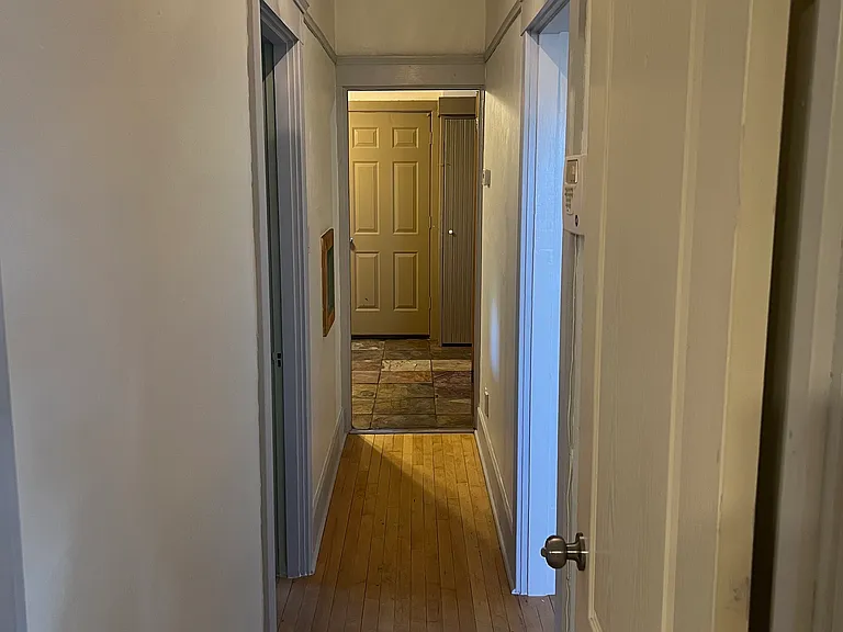 Hallway separating Master bedrooms