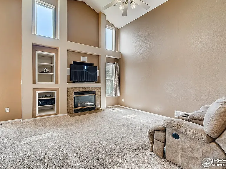 Living room with gas fireplace.