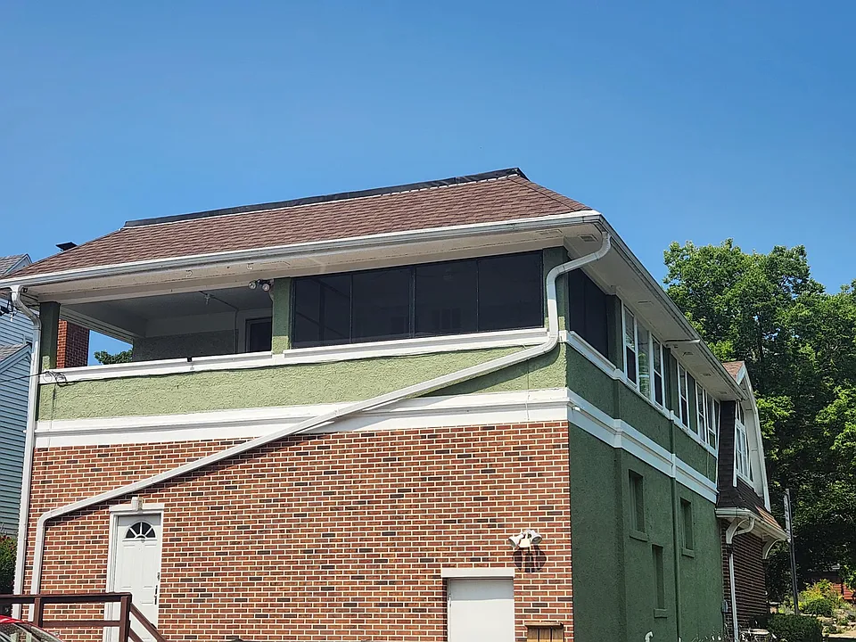 View of screen porch and back of apartment (second floor)