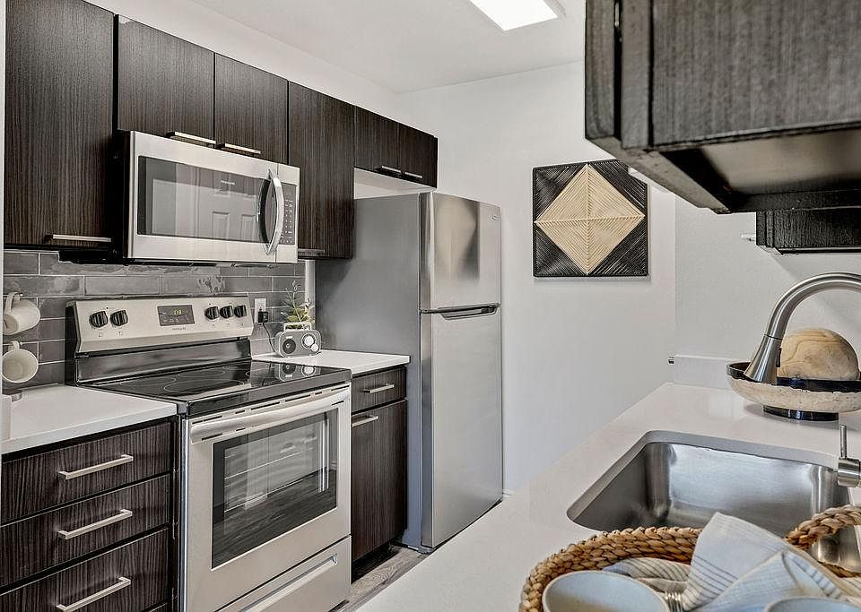 Renovated Kitchen With Stainless Steel Appliances