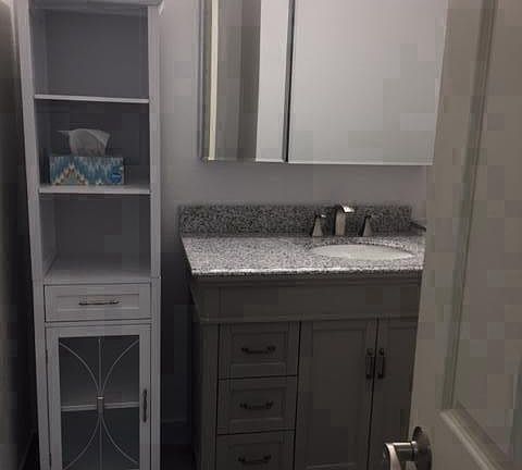 Remodeled bathroom, granite vanity.