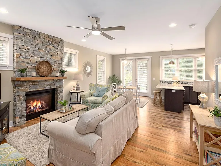 Living Room with Gas Fireplace and Stone Surround