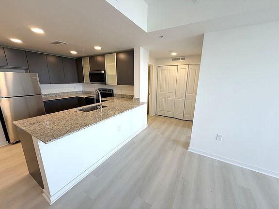 4th image of 5587 Millenia Park Blvd #413