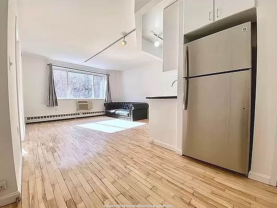 1st image of 319 E 8th St APT 6A