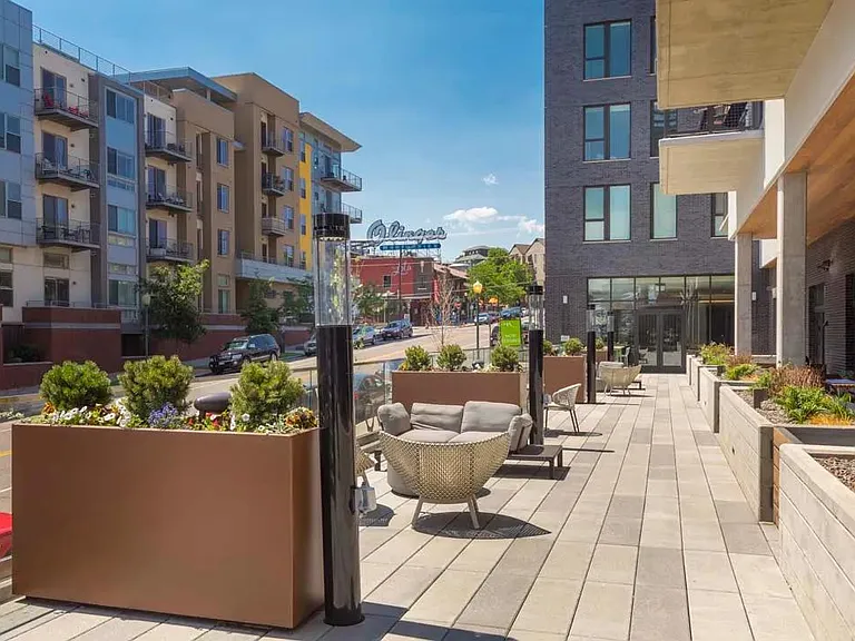 There's plenty of outdoor space to enjoy at Modera LoHi, like this outdoor patio just above street level.