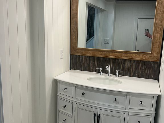 Basement bathroom . Large space with laundry