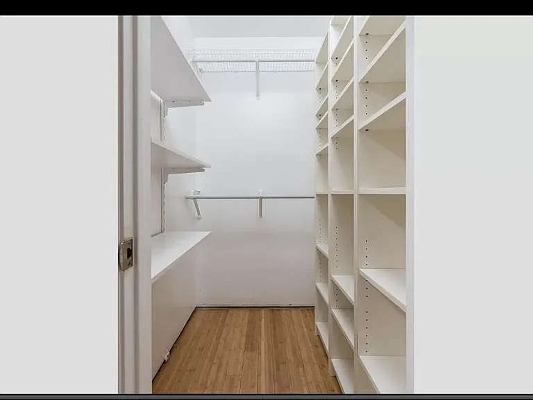 spare bedroom closet. a lot of storage