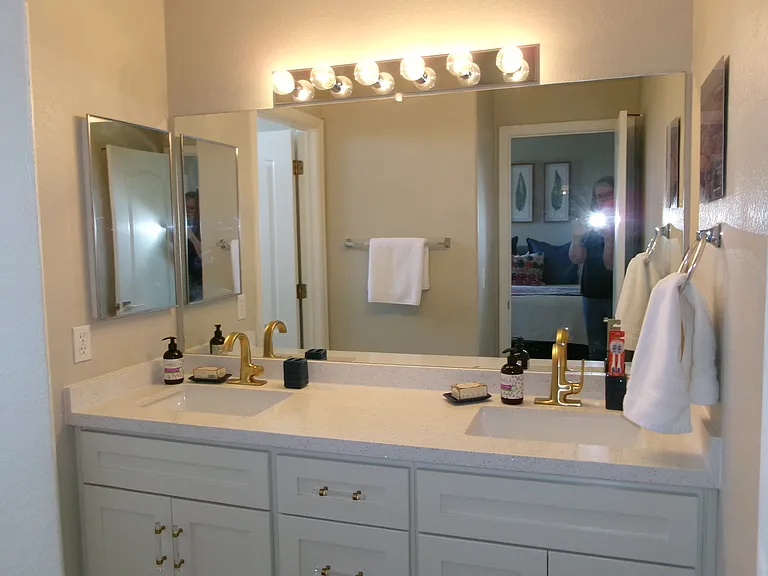 New faucets, new sinks, new mirrors, new quartz counters, new custom made vanities.