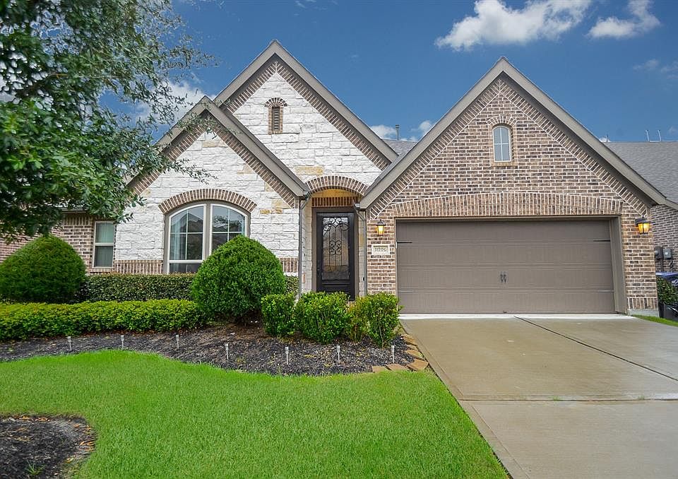 Featuring a multiple car garage, manicured lawns and tons of space to make new memories.
