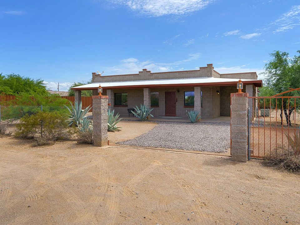 Front Of Home With Gate Open