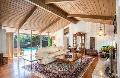 Formal living overlooking swimming pool