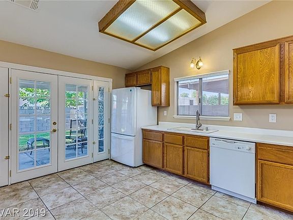 Custom French doors from kitchen to back patio