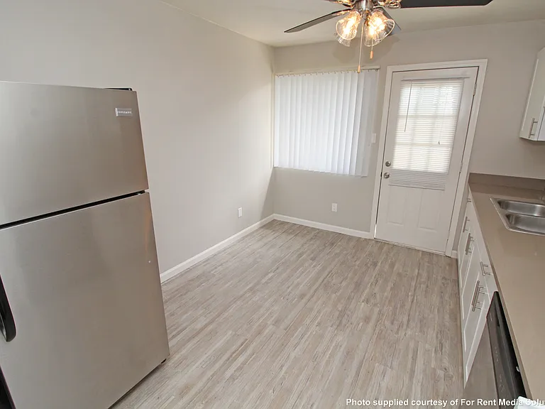 Notice the door leading to your private backyard. Each one is equipped with a Pet Door, so your pet can access the yard when you're not home.