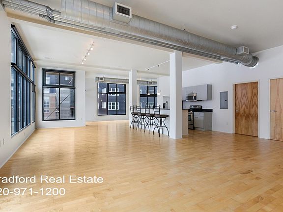Corner unit, high ceilings!